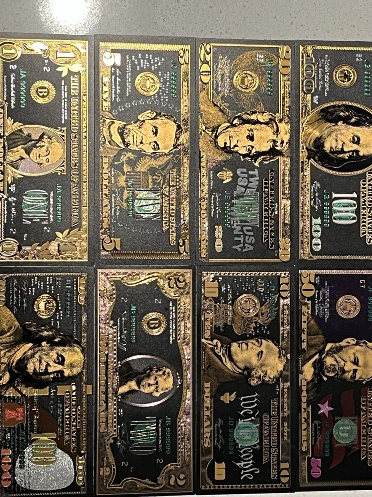 Glittering Black Gold Foil Banknotes. Comes In Top Loader Sleeves. Lot Of 7 Pcs.